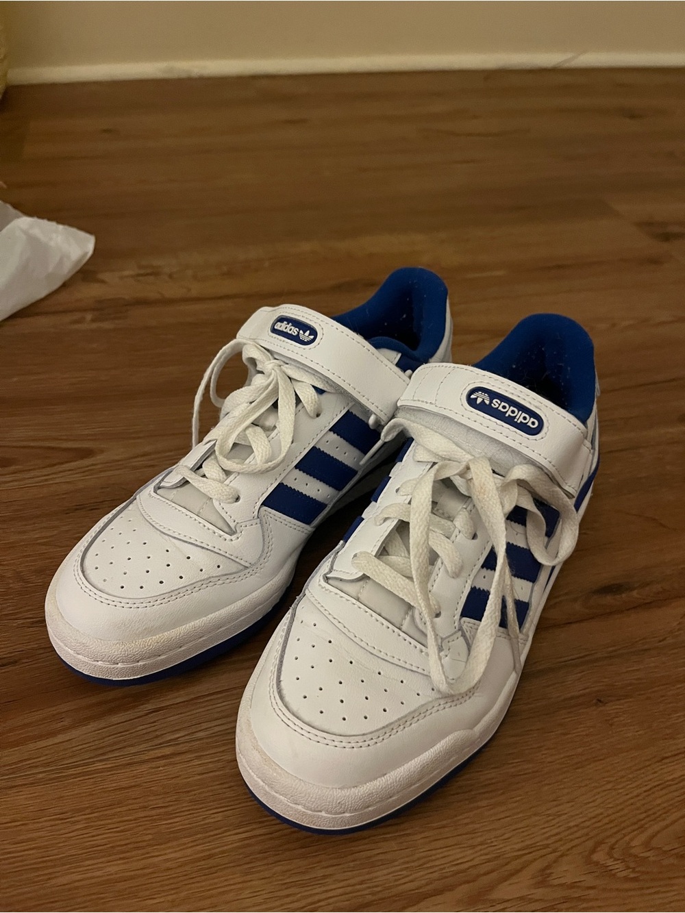 Forum Low in White/Royal Blue US men's 8 / women's 9.